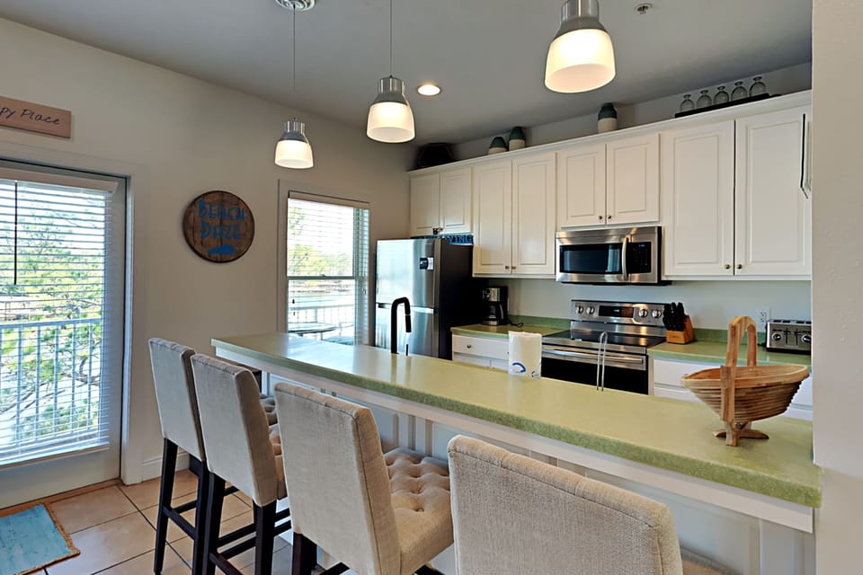 Condo, 1 Queen Bed, Balcony (#214E) | Private kitchen | Fridge, microwave, oven, stovetop