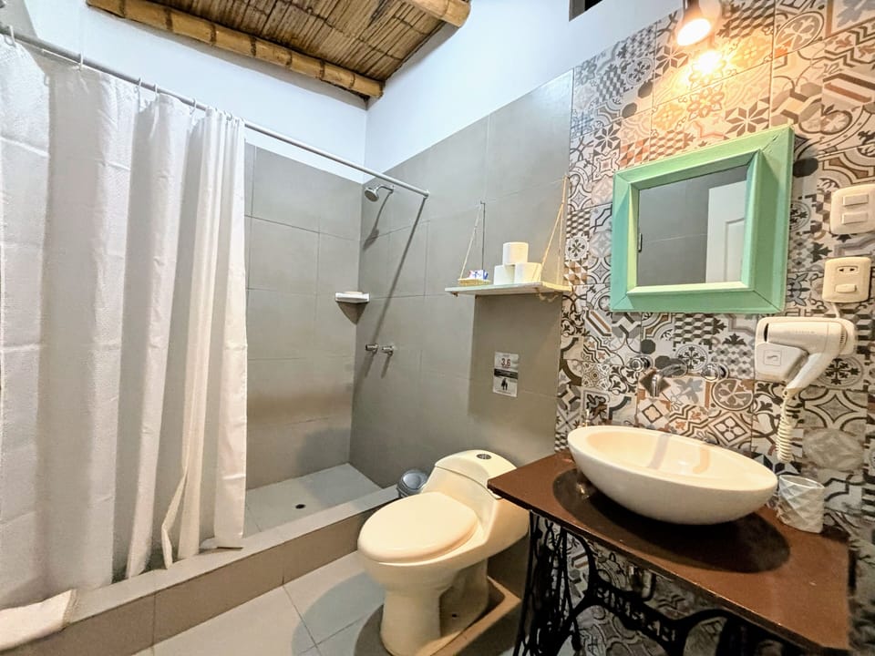 Family Room, Multiple Beds | Bathroom | Free toiletries, hair dryer, towels