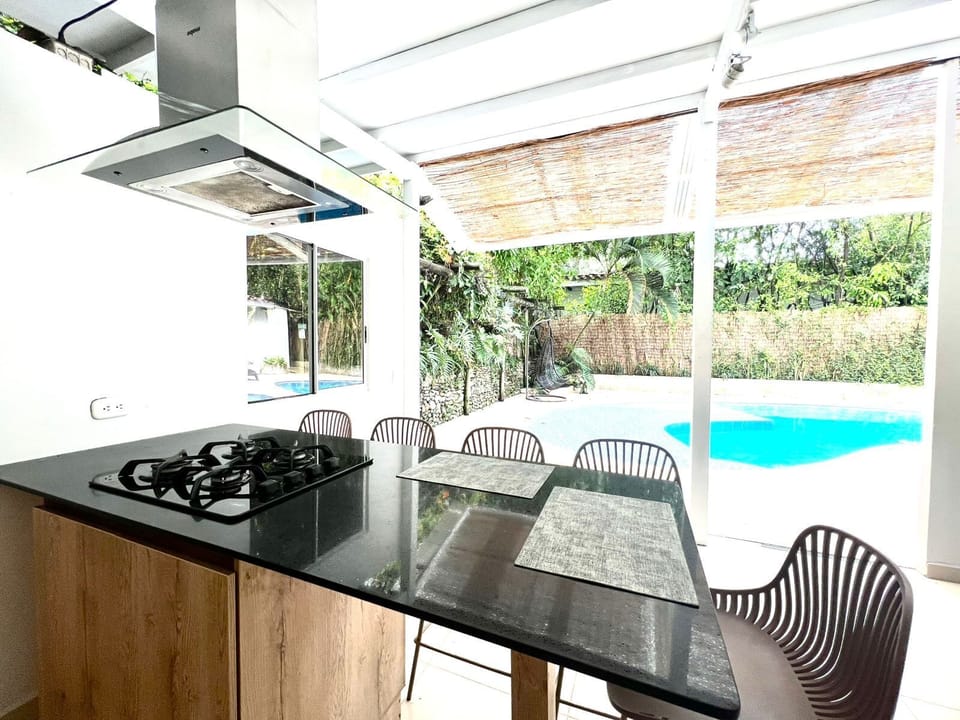 Villa | Private kitchen | Full-size fridge, microwave, coffee/tea maker, blender