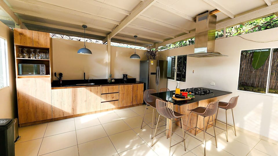 Villa | Private kitchen | Full-size fridge, microwave, coffee/tea maker, blender