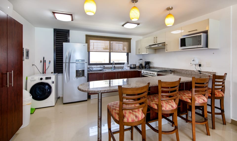 Full equipped kitchen with washer