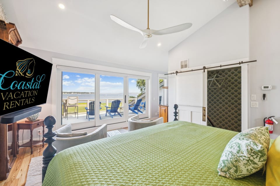 Bedroom 5 - A newly added fifth bedroom on the third floor features a king bed, its own living area and bathroom, and outstanding views of the golf course.