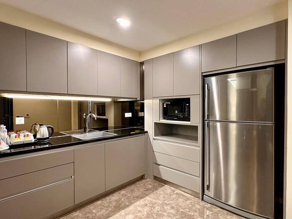 Family Suite, 3 Bedrooms | Living area | 40-inch LCD TV with satellite channels, TV