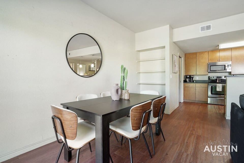 Spacious and open living and dining room with smart tv