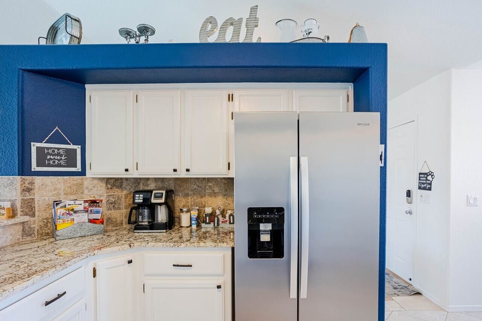 fully equipped kitchen, complete with stainless steel appliances and plenty of counter space.