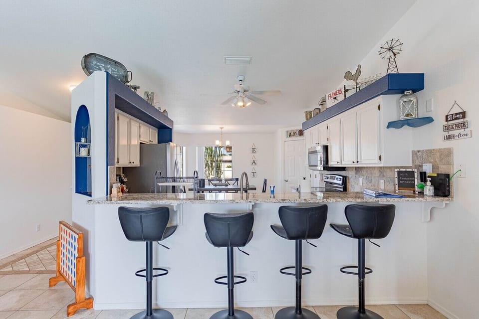 Four (4) barstools at the counter