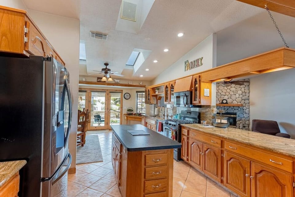 fully-equipped, spacious kitchen, complete with a large island