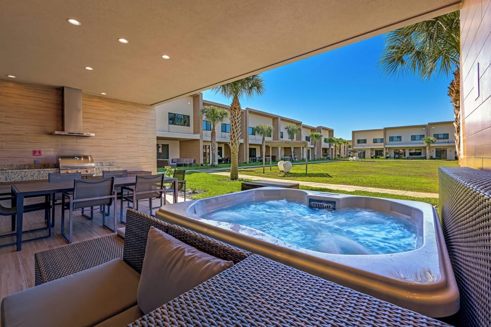 Private spa and summer kitchen on back patio