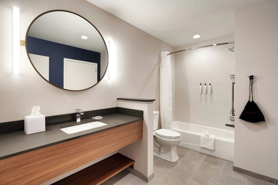 Rainfall showerhead, free toiletries, hair dryer, towels