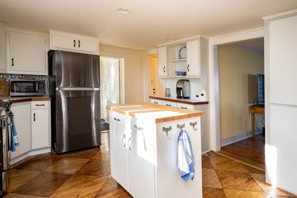 Large kitchen has everything you need to make a home cooked meal.