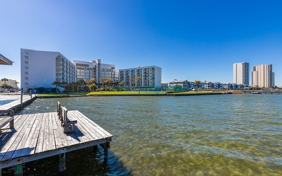 Sit on the dock while taking in beautiful views of the beach and surrounding palm trees at this lovely rental property