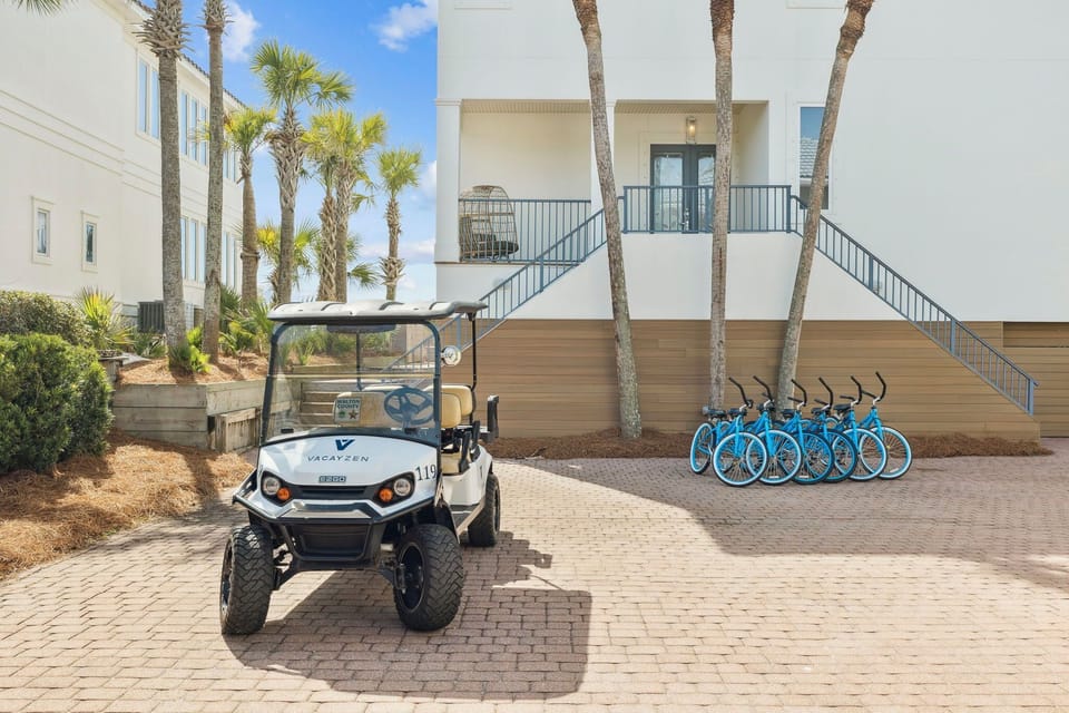 Modern beachside property with complimentary bicycles and golf cart for easy transportation around the area.