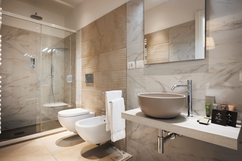 Shower, free toiletries, hair dryer, slippers