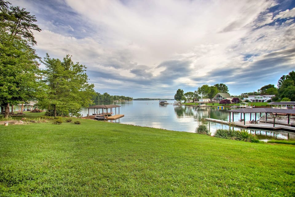 Back Yard and Lake showing the gentle slope getting to the dock. 