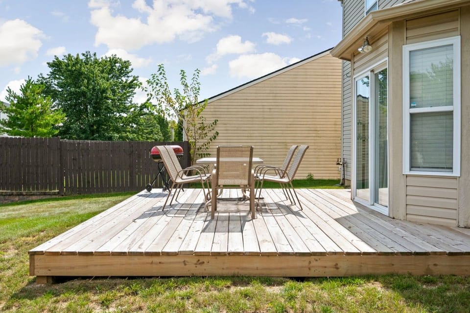 Back deck with table and chairs