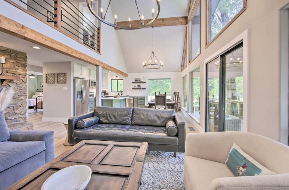 Living area and kitchen open up to the lofted lounge.