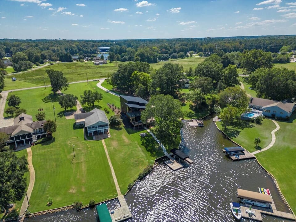 Aerial view of the property from the backyard perspective.