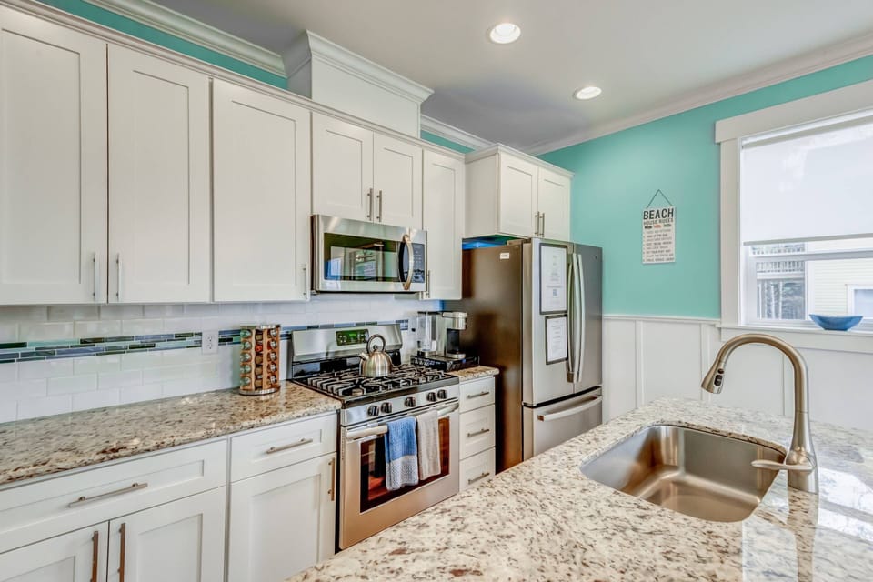 The kitchen has ample counter space and up to date appliances.