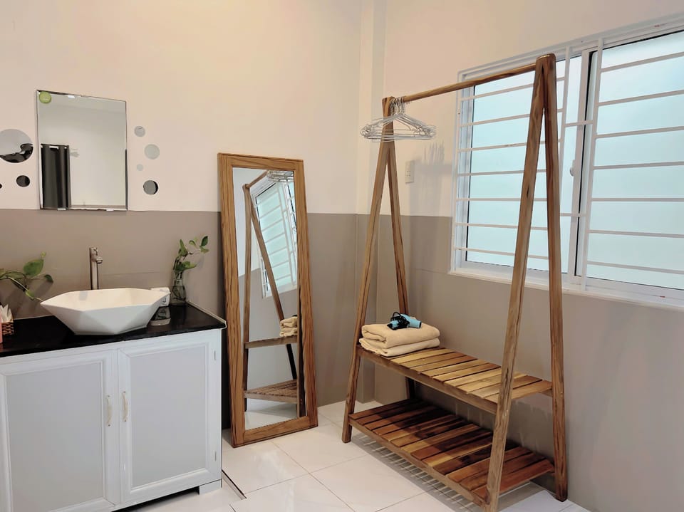 Superior Room | Bathroom | Rainfall showerhead, hair dryer, slippers, towels