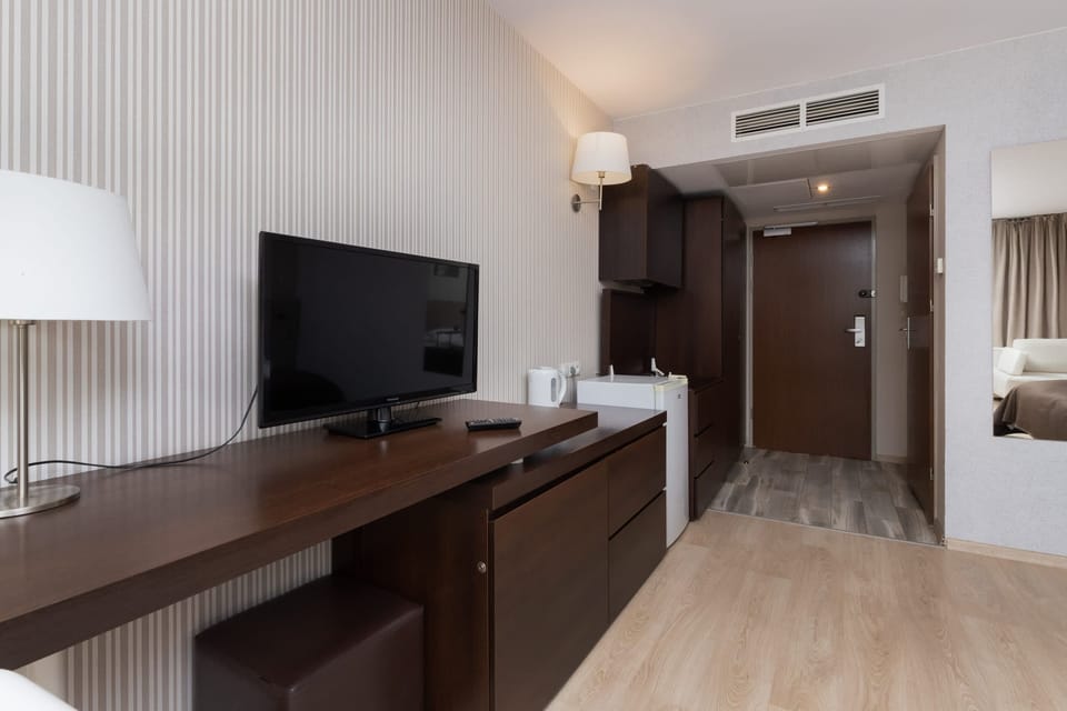 A view from the bedroom highlighting its open layout and well-organized furnishings.
