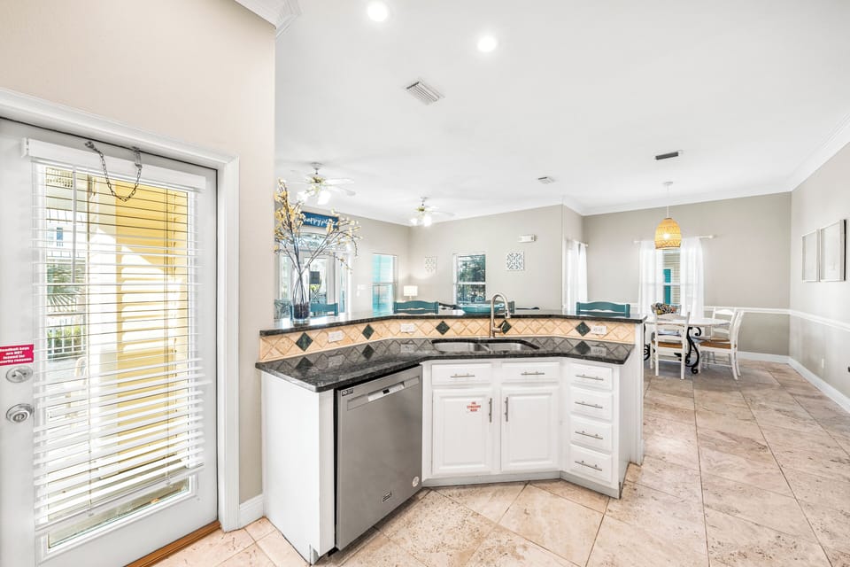 Fully Stocked Kitchen with Separate Access to the Wraparound Porch