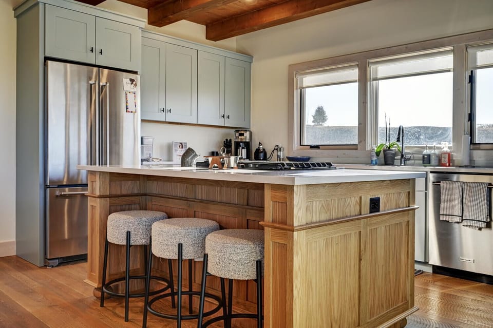 Kitchen island seats up to 3 guests.
