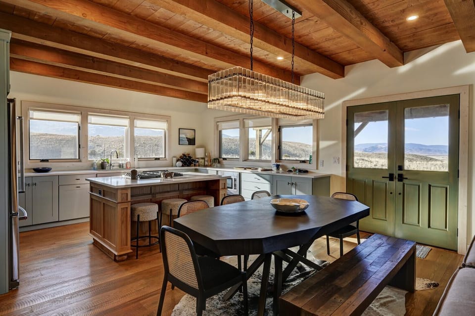 Beautiful open concept living, dining and kitchen area with lots of natural light.