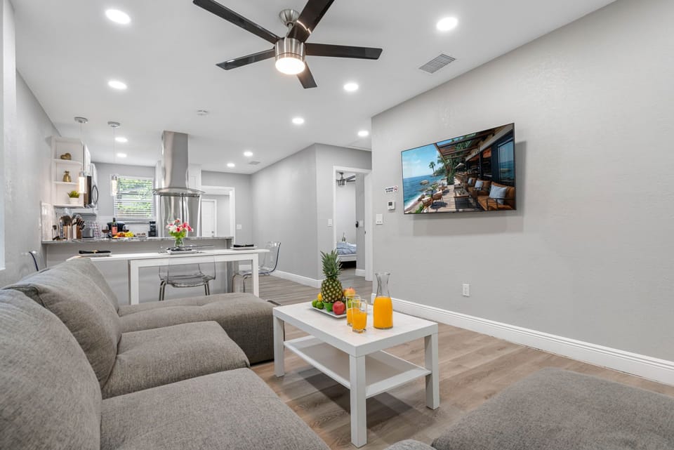 Spacious L-shaped sectional in the living room — plenty of seating for the whole group.