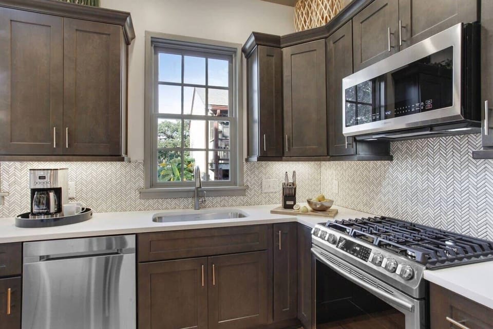 Open Concept Chef's Kitchen | Fully Stocked | Open to Dining | First Floor
