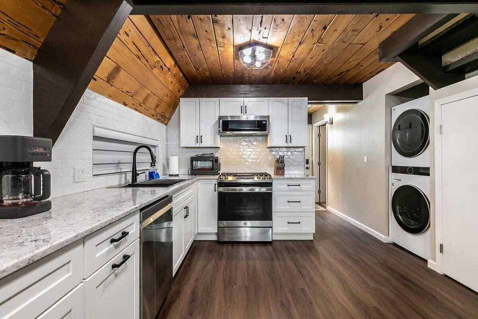 The chef in your group will enjoy preparing a meal in the modern all-white kitchen that is fully equipped with everything you need to prepare a tasty meal.