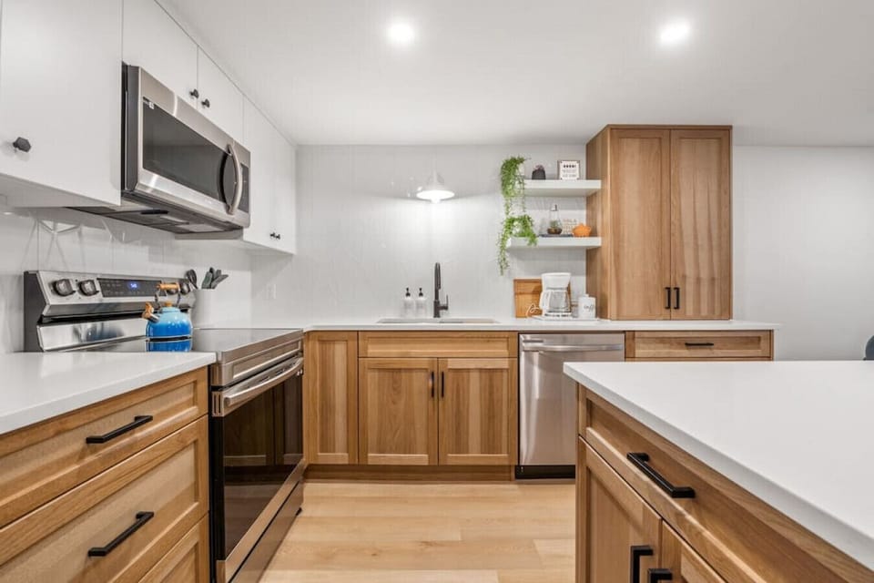 Full kitchen with a drip coffee machine, ground coffee, tea, sugar and basic condiments (ketchup, mustard and relish.)