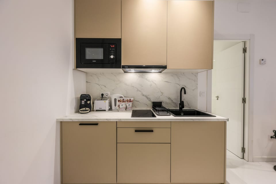 View of the kitchen with appliances