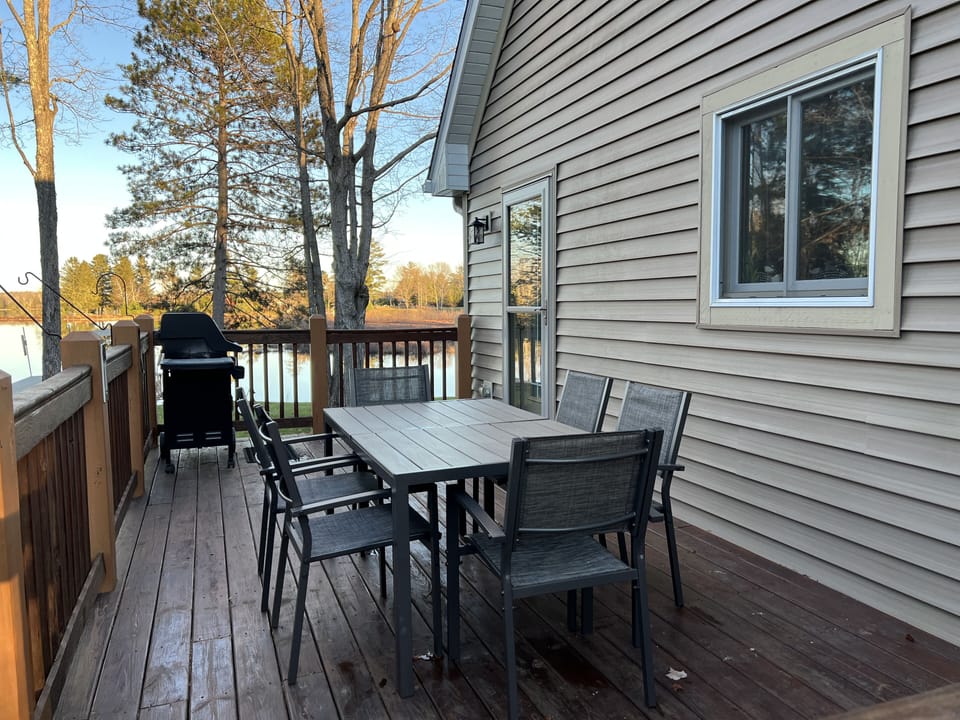 Cook a delicious meal with a Weber Gas Grill while overlooking the lake.
