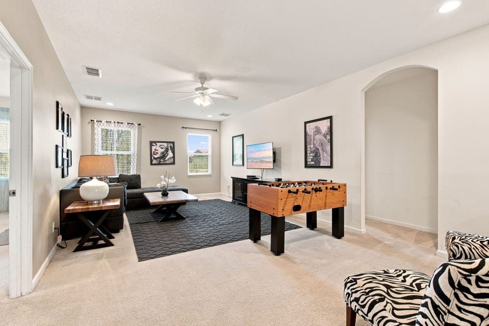 Spacious upstairs living room retreat! Foosball table! Flat screen tv!