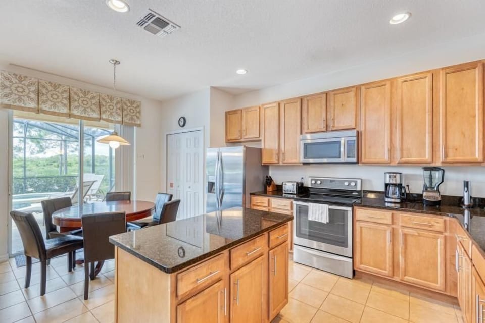 The kitchen is fully stocked with all of the tools and appliances you may need for a quick snack