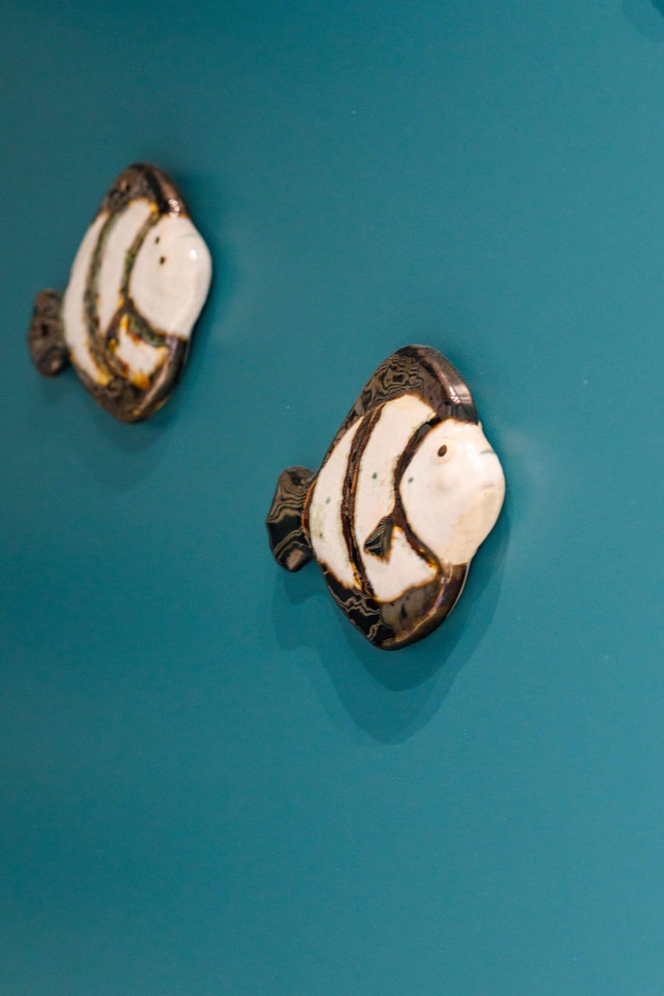 A close-up of decorative wall lights, adding warmth and elegance to the space.
