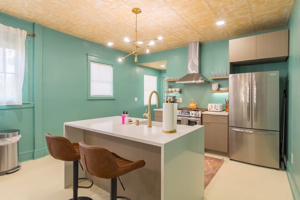 Fully stocked kitchen with all utensils, pots, pans, cookware and plates needed to cook a great meal!
