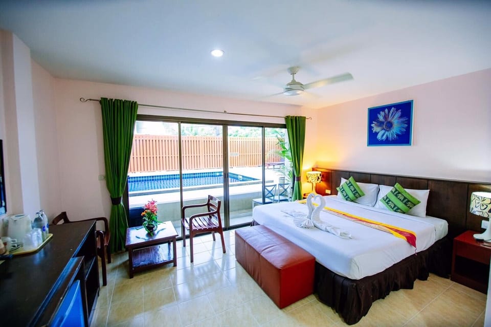 Deluxe with Pool Access | Individually decorated, individually furnished, desk, free WiFi