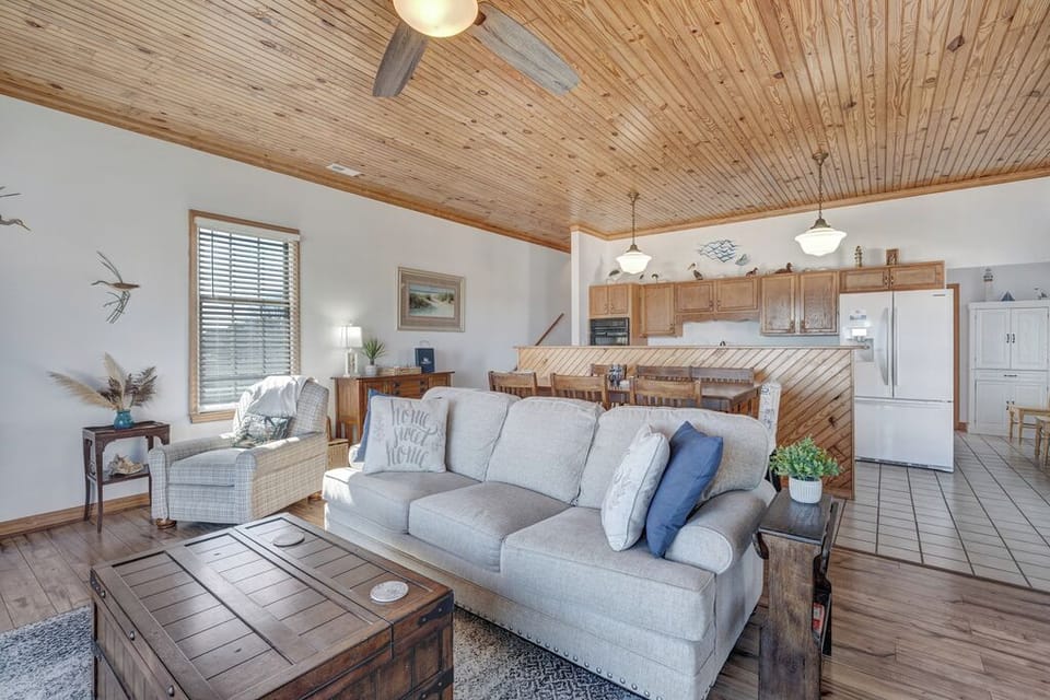 Gorgeous Hardwood Floors and Warm Wood Soaring Ceilings.