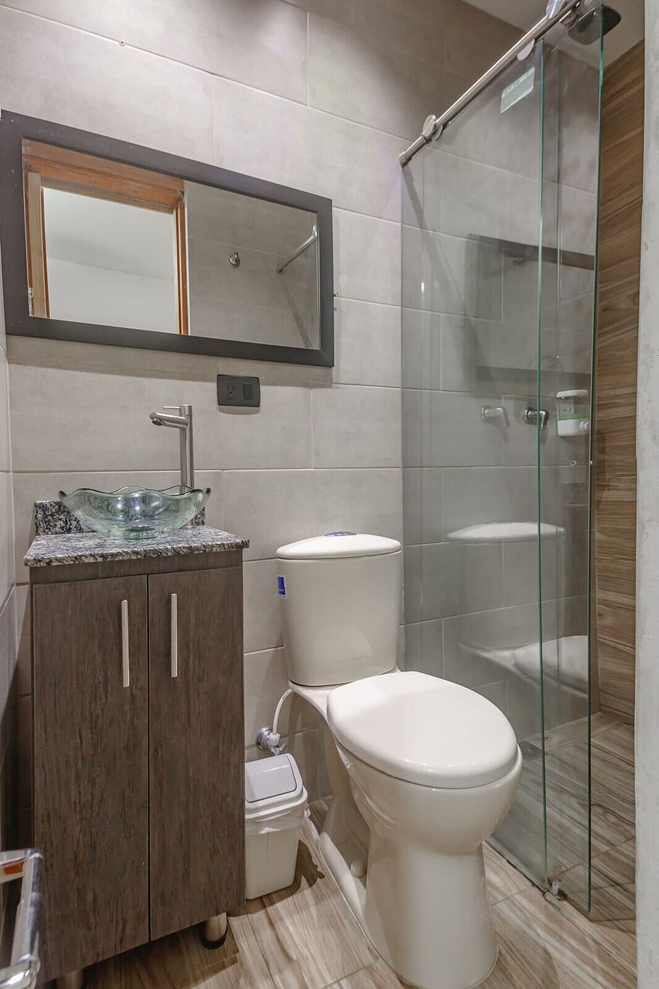 Shower, rainfall showerhead, towels, soap