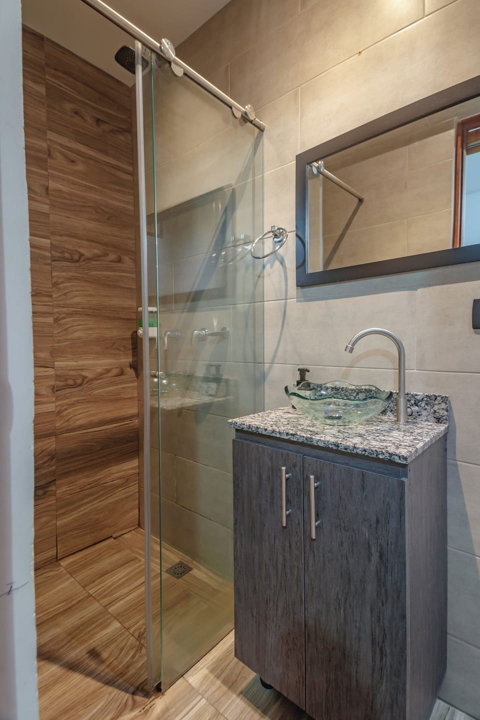 Shower, rainfall showerhead, towels, soap