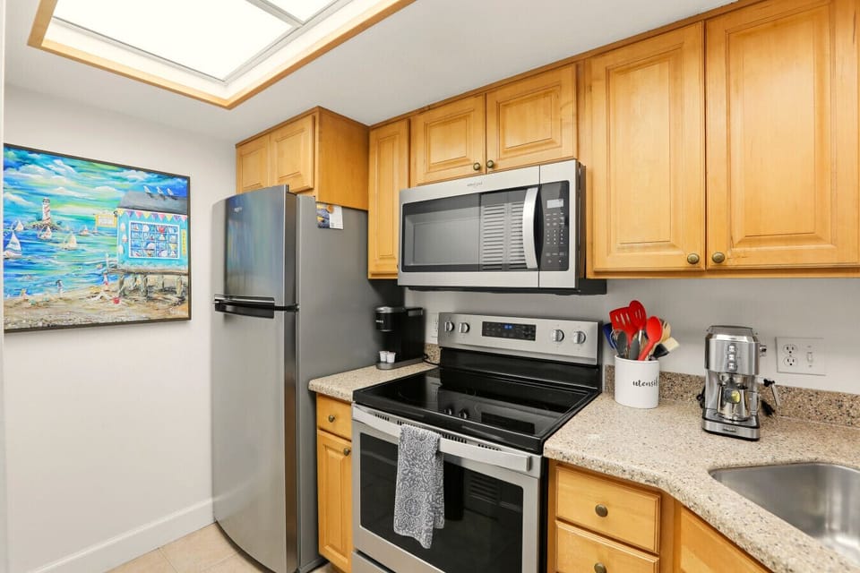 Kitchen area, Coffee pod machine & espresso machine.
