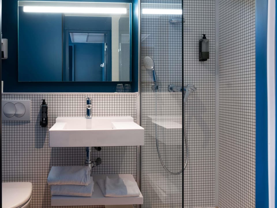 Desk, laptop workspace, blackout drapes, soundproofing