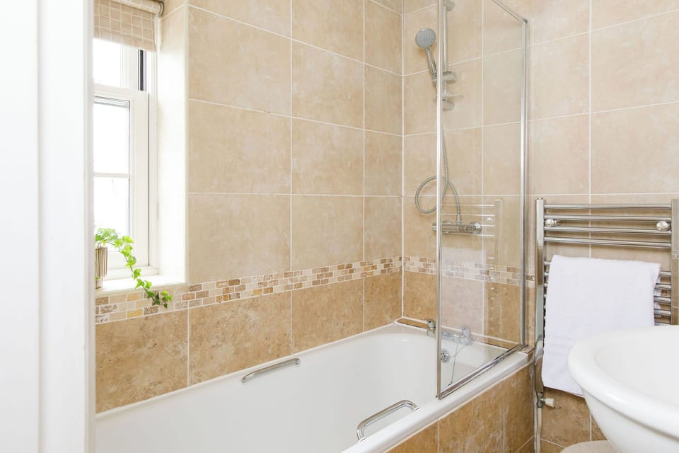 Bathroom shower and bath combined 
