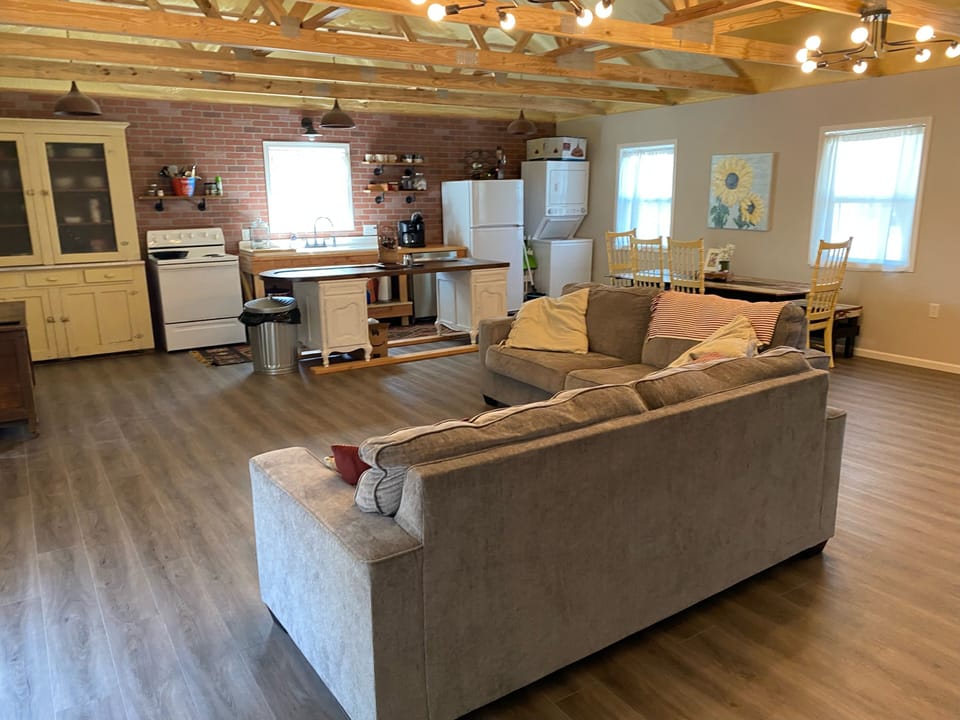 Open concept kitchen, dining and living room