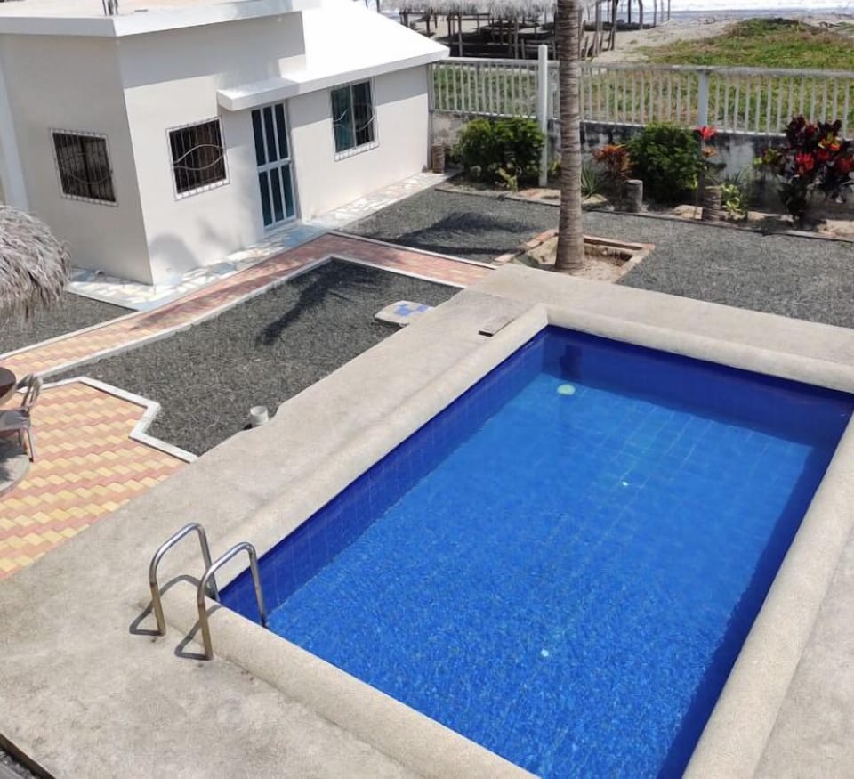 Outdoor pool, open 7:00 AM to 7:00 PM, sun loungers