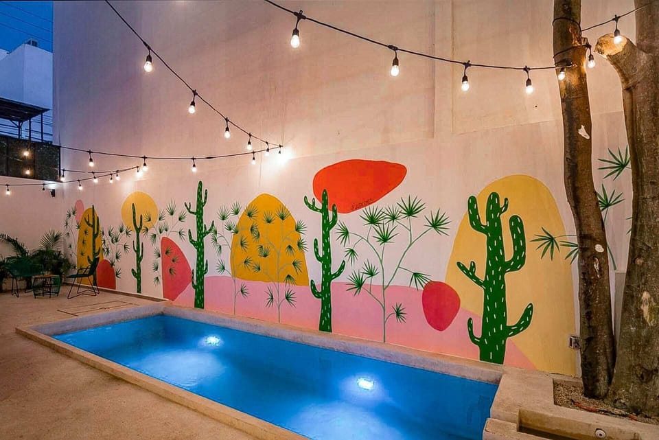 Artistic wall graffiti - choose a unique and trendy accommodation in Playa del Carmen.