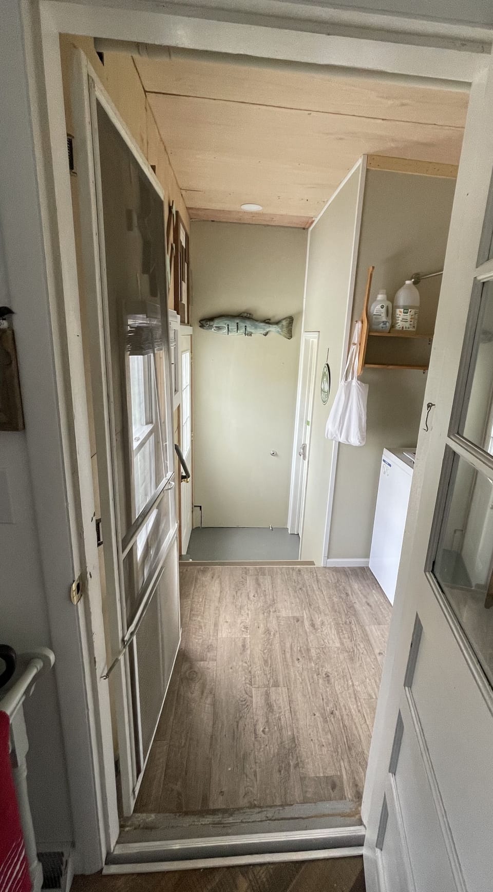 Back door leads from kitchen, thru laundry room, out side door, to fenced yard
