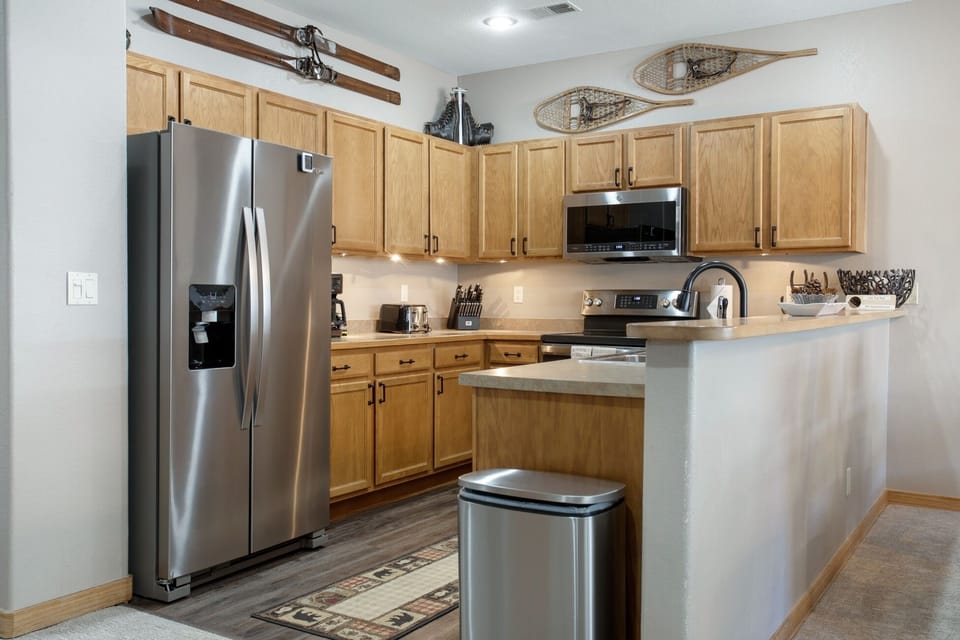 Condo, 3 Bedrooms | Private kitchen | Fridge, oven, coffee/tea maker, toaster