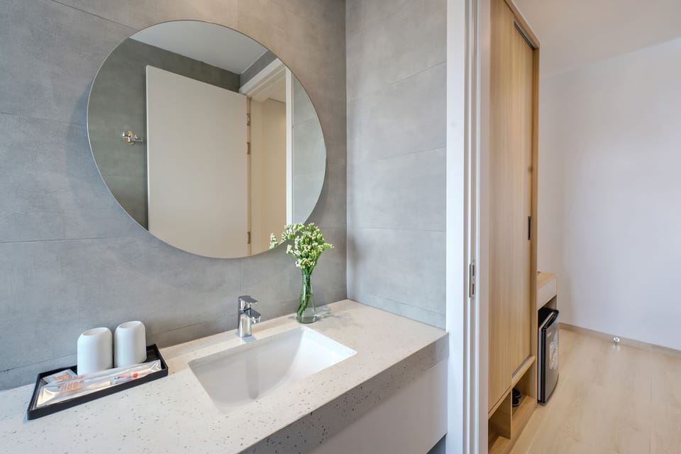 Shower, rainfall showerhead, designer toiletries, hair dryer